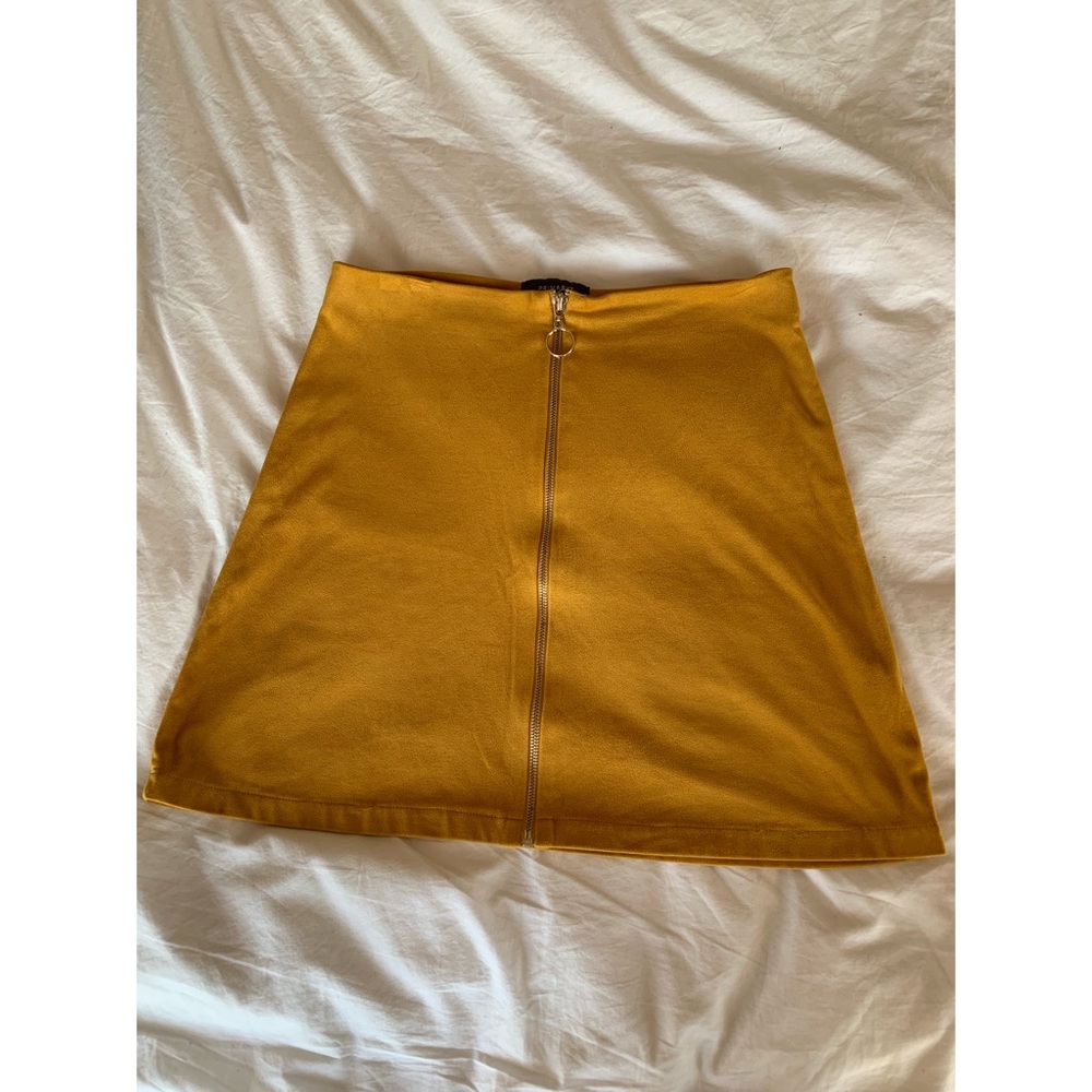 Yellow suede mini skirt